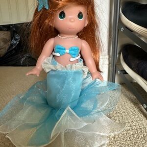 Precious Moments Ariel Doll with stand bought in Disney World